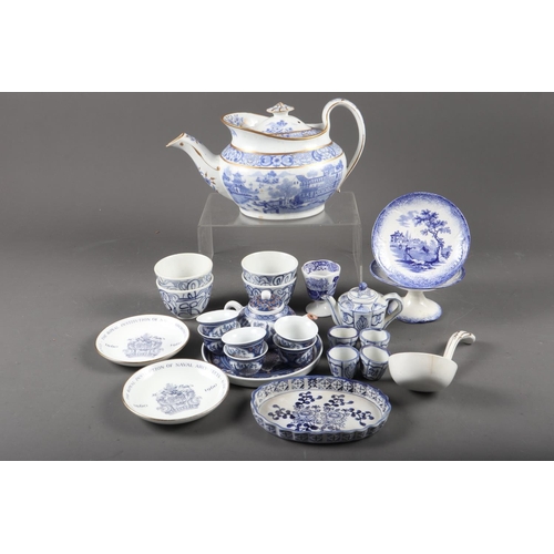 103 - A Factory X blue and white teapot, two saki sets and other blue and white china