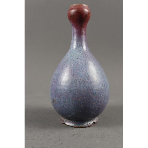 117 - A Chinese purple streak glazed shaped vase, 7 1/2