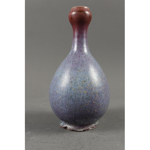 117 - A Chinese purple streak glazed shaped vase, 7 1/2