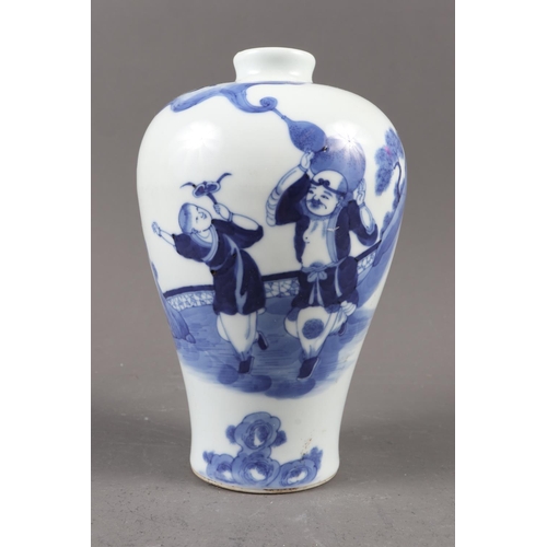 119 - A pair of Chinese blue and white gu vases with floral decoration and double ring marks to base, 10