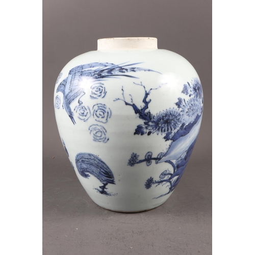 120 - A Chinese blue and white fish bowl with dragon and flower decoration, 10