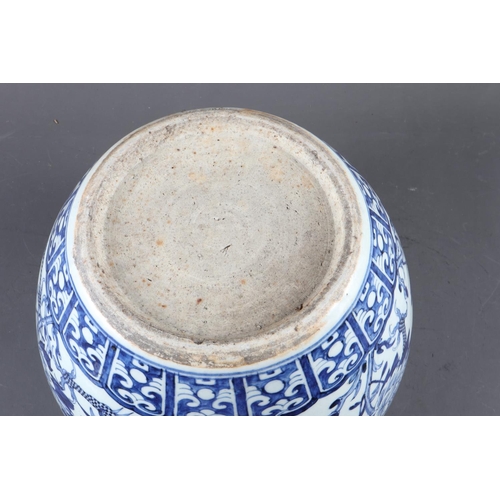 120 - A Chinese blue and white fish bowl with dragon and flower decoration, 10