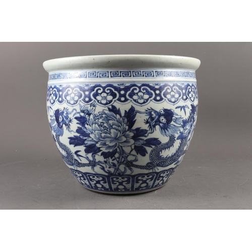 120 - A Chinese blue and white fish bowl with dragon and flower decoration, 10