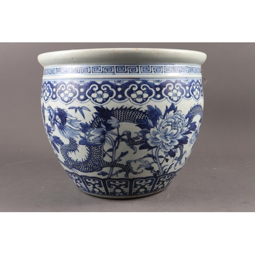 120 - A Chinese blue and white fish bowl with dragon and flower decoration, 10