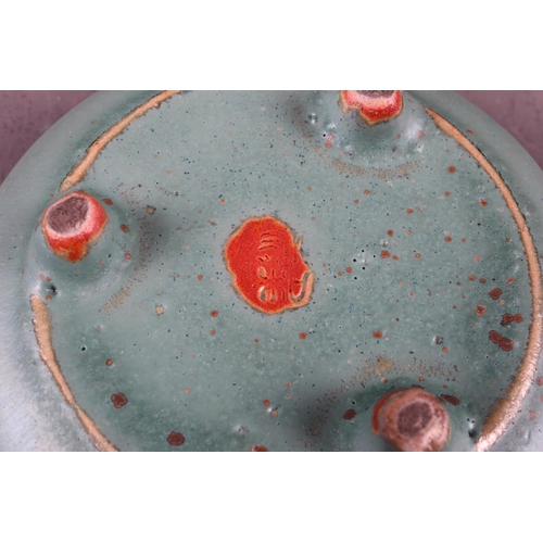 122 - A Chinese pale blue glazed dish with six-character mark to base, 4 1/2