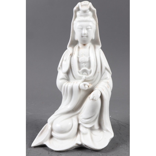 123 - A Chinese blanc-de-chine figure of a deity, 7