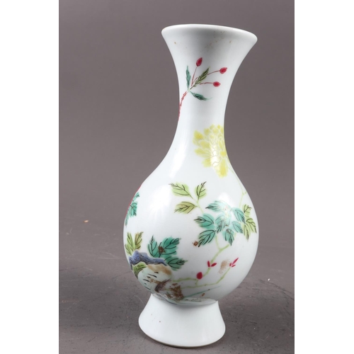 124 - A Chinese famille verte baluster vase with flower and leaf decoration, 7 3/4