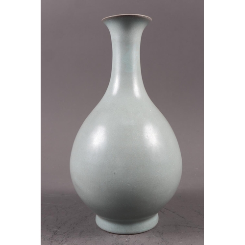 127 - A Chinese celadon glazed ovoid shaped vase, 7 3/4