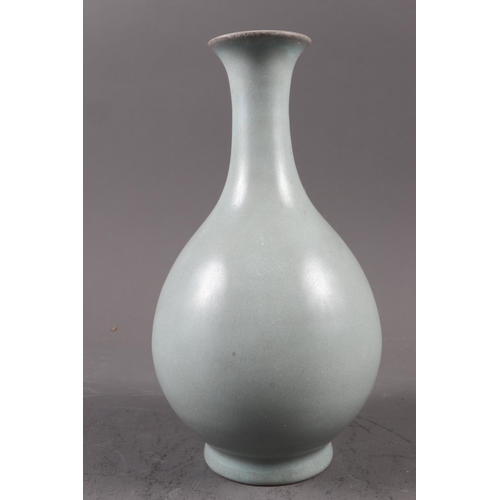 127 - A Chinese celadon glazed ovoid shaped vase, 7 3/4