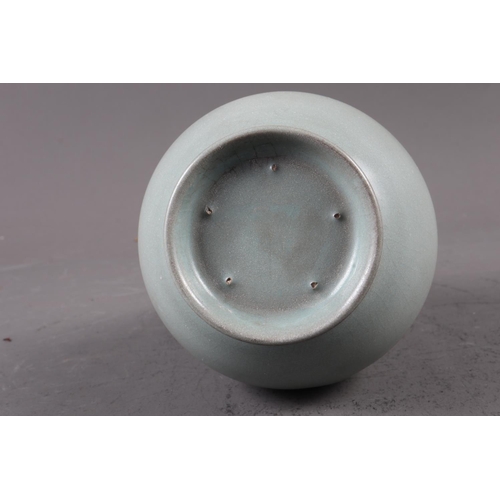 127 - A Chinese celadon glazed ovoid shaped vase, 7 3/4