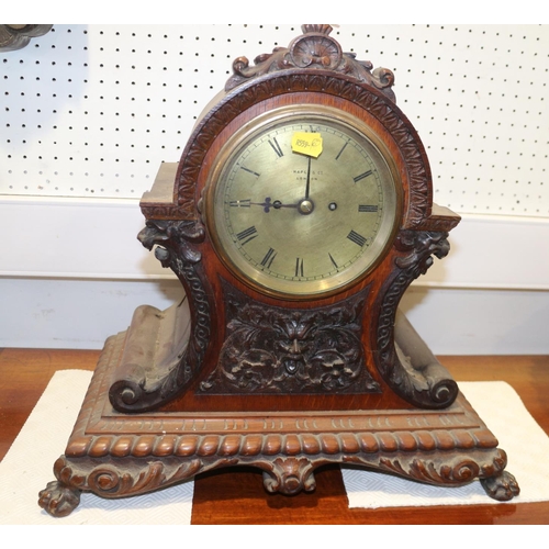 136 - A carved oak mantel clock with eight-day striking movement with gilt dial and Roman numerals, 17