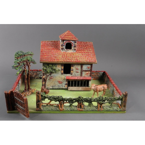 186 - An early 20th century Hausser Elastolin composite and wooden model farmhouse with hedge and wall, si... 