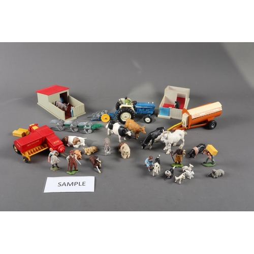 187 - A Britains composite model barn, model farmyard animals, figures and accessories, various