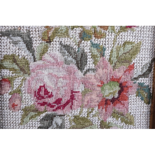 199 - A 19th century chainstitch panel of Flora on a linen ground, 30