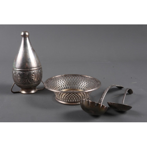 260 - A silver openwork bonbon dish, 1.4oz troy approx, two sugar spoons, 2oz troy approx, and an 830 two-... 