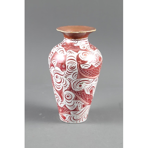 4 - A William de Morgan ruby lustre vase with fish design, 8 1/2