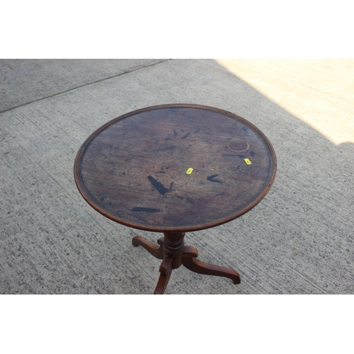 400 - A 19th century mahogany circular top birdcage occasional table, on turned column and tripod supports... 