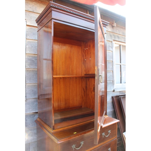 411 - A late Victorian figured mahogany and box line inlaid cupboard, on chest of four long drawers, on br... 