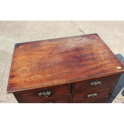 416 - A Georgian mahogany chest of four short and two long graduated drawers, on bracket feet, 27 1/2