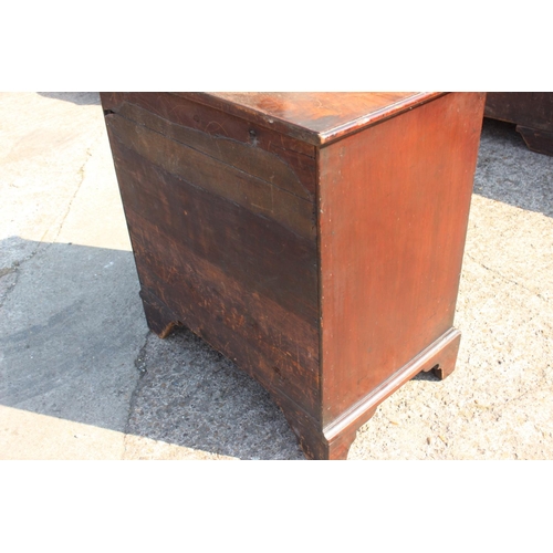 416 - A Georgian mahogany chest of four short and two long graduated drawers, on bracket feet, 27 1/2