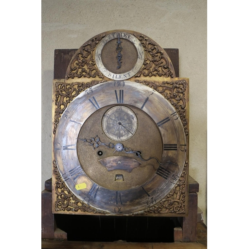 462 - A Georgian figured mahogany long case clock with arch top brass dial, silvered chapter ring, seconds... 