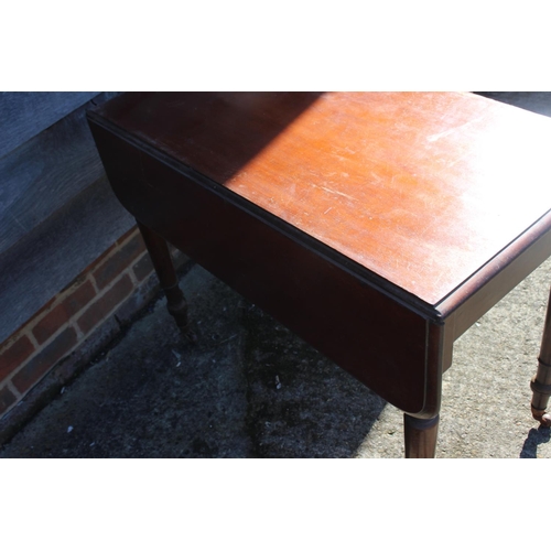 515 - A mahogany Pembroke table, fitted one drawer, on turned and castored supports, 35