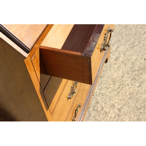 528 - A Heals 1930s walnut and banded fall front bureau with fitted interior over four long drawers, on br... 