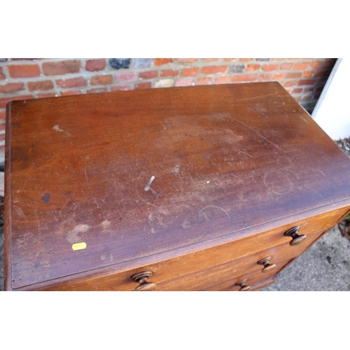 531 - A mahogany chest of three long drawers with knob handles, on block base, 36