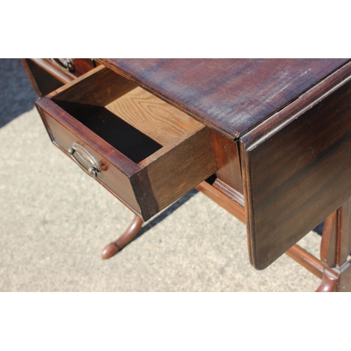 532 - A mahogany sofa table, fitted two drawers, on turned and stretchered splay supports, 24