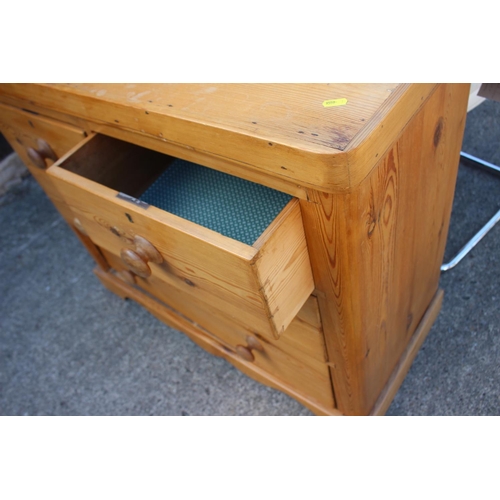 546 - A waxed pine chest of two short and two long drawers, on bracket feet, 37 1/2