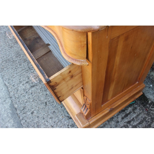 556 - A late 19th century waxed pine double serpentine front chest of eight drawers with glass knob handle... 