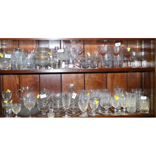 96 - A set of ten cut and engraved wine glasses, a set of six whisky tumblers and other cut table glass