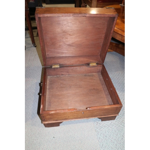 483 - A mahogany low rectangular workbox with brass top corners and carrying handles, on bracket supports,... 