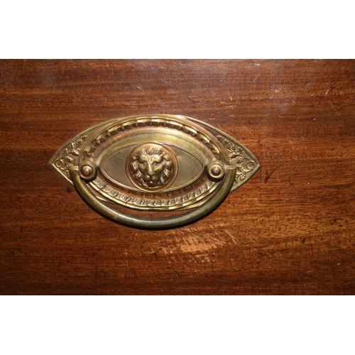 422 - A 19th century mahogany linen press enclosed two doors over four drawers with brass oval handles, on... 