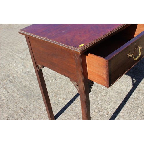 443 - An early 20th century walnut side table, fitted two drawers, on square supports, 42