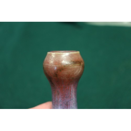 117 - A Chinese purple streak glazed shaped vase, 7 1/2