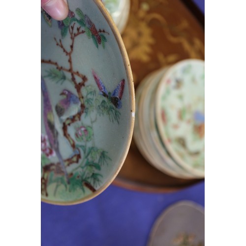 121 - Eleven matched Chinese celadon glazed plates with precious object, bird, flower and leaf decoration,... 