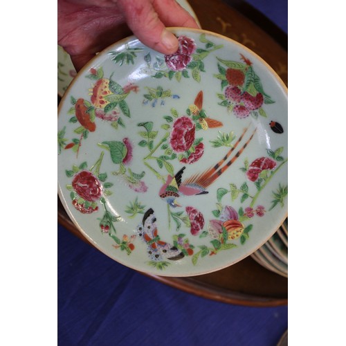 121 - Eleven matched Chinese celadon glazed plates with precious object, bird, flower and leaf decoration,... 