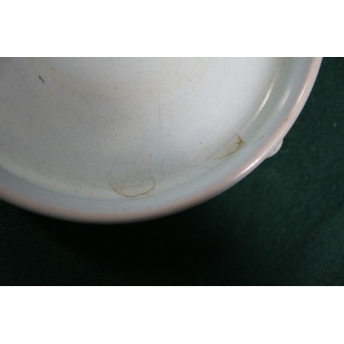 122 - A Chinese pale blue glazed dish with six-character mark to base, 4 1/2