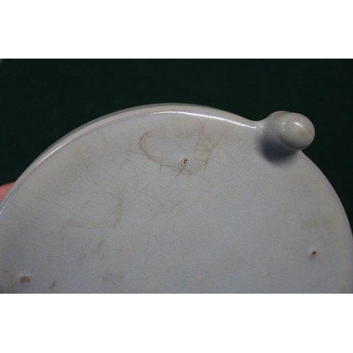 122 - A Chinese pale blue glazed dish with six-character mark to base, 4 1/2