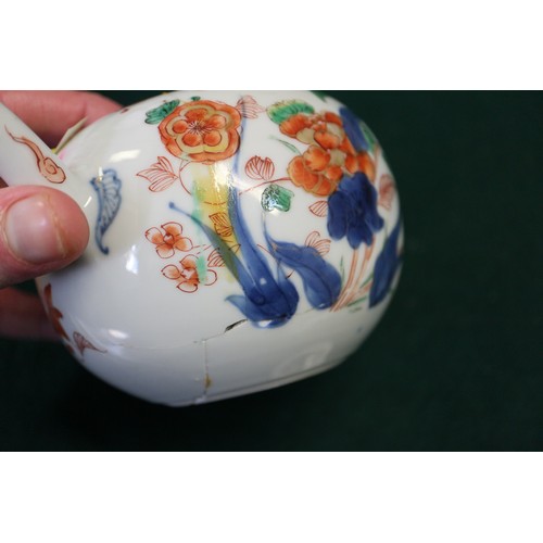 124 - A Chinese famille verte baluster vase with flower and leaf decoration, 7 3/4