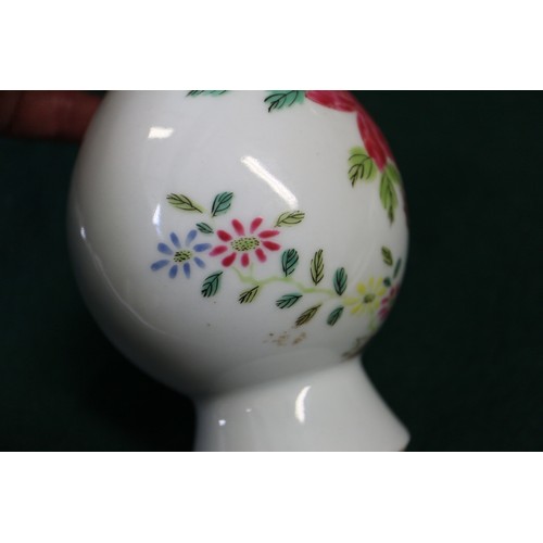 124 - A Chinese famille verte baluster vase with flower and leaf decoration, 7 3/4