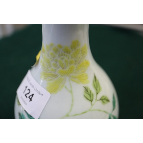 124 - A Chinese famille verte baluster vase with flower and leaf decoration, 7 3/4