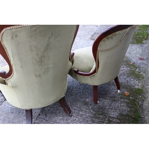 457 - A gentleman's late Victorian mahogany show frame armchair and companion ladies spoon back chair, but... 