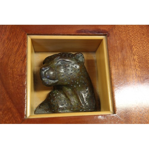 167 - Donald Greig: a limited edition bronze portrait, head of a cheetah, mounted on a sapele mahogany box... 