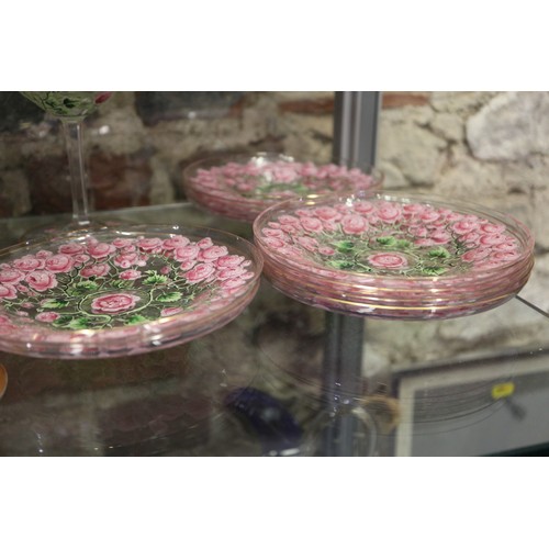 56 - An early 20th century Continental glass table service with enamelled pink cabbage rose decoration an... 