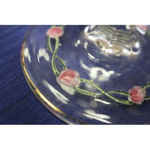 56 - An early 20th century Continental glass table service with enamelled pink cabbage rose decoration an... 