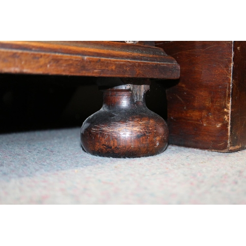 425 - A figured walnut and feather banded chest of two short and three long graduated drawers, on bun feet... 