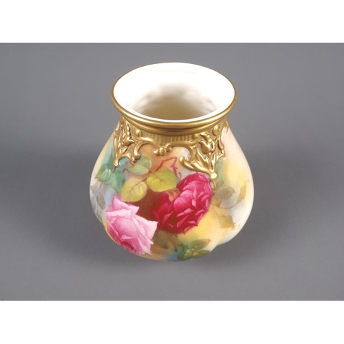 39 - A Royal Worcester vase with rose decoration, 4 1/4