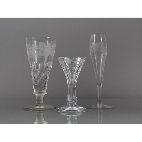 66 - A wine glass with faceted bowl and vine and grape design, 5.7